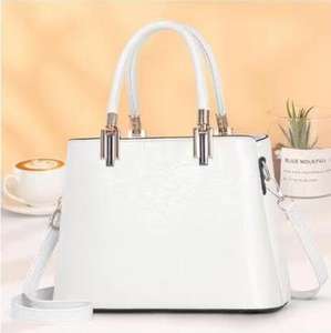 Nouvelle tendance en gros de luxe en cuir PU femme sacs à <span class=keywords><strong>main</strong></span> dames couleur unie <span class=keywords><strong>sac</strong></span> à <span class=keywords><strong>main</strong></span> gland femmes sacs à <span class=keywords><strong>main</strong></span> - Product Image 6