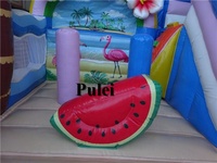 Château gonflable Flamingo avec toboggan et aire de jeux pour enfants, idéal pour les fêtes et usage commercial