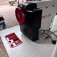 Machine à coudre industrielle Two Lion pour la fabrication de vêtements : machine à point noué à entraînement direct, motorisée et contrôlée par ordinateur