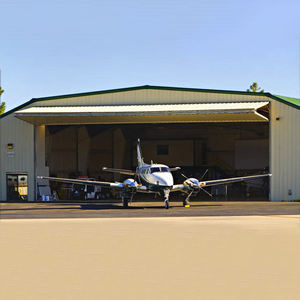 Лидер продаж, электрические двухскладные подъемные двери для самолетов, вертикальные двухскладные гаражные двери, сверхпрочные складные гаражные двери - Product Image 2