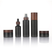 Botol kosmetik perawatan kulit, Set wadah kemasan 100ml tutup bambu Lotion kaca pompa botol Matte buram hitam