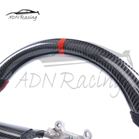 Volant sport en fibre de carbone noir brillant pour Jeep Wrangler JK 4 Runner 2007-2011 (vente en gros)