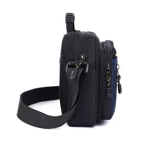 Nuevo bolso bandolera para hombre, pequeño, de tela Oxford, duradero, para uso diario y viajes, en colores negro, azul, gris y verde. - Product Image 1