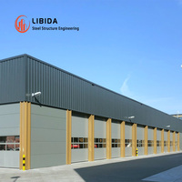 Atelier et entrepôt préfabriqués en acier modernes, résistants aux intempéries et à haute résistance pour l'usinage industriel