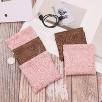 Porte-monnaie compact en cuir PU de luxe à fermeture à pression, motif floral en relief, mini porte-monnaie multifonctionnel pour les voyages quotidiens