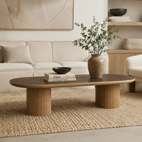 Table basse ovale avec plateau en marbre, bord en bois, base en piédestal cannelé pour salon