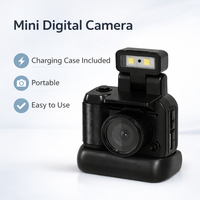 Mini caméra numérique en forme de bouton avec étui de charge MicroSD, caméra de poche pour étudiants, flash intégré, enregistrement 1080P, vente en gros