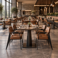 Fauteuils en cuir caramel, table à manger en pierre frittée, base en métal noir, restaurant, commercial, personnalisable, OEM, vente en gros