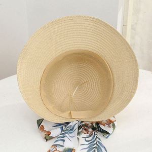 Chapeau de soleil de plage en paille pour femme à large bord avec nœud, idéal pour l'été et les vacances en plein air - Vente en gros - Product Image 4