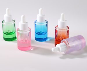 Flacon compte-gouttes en verre transparent dégradé 20 ml pour sérum de soin et huile capillaire, emballage en gros pour marque privée OEM MLM - Product Image 1