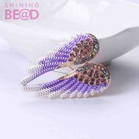 Nouvelle Broche de Luxe en Strass Ailes d'Ange et Plumes pour Vêtements et Bijoux, Idéale pour Mariages, Fêtes et Cadeaux pour Femmes