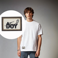 Fournisseur de patchs thermocollants composites, étiquettes en cuir tissé personnalisées avec logo sur base en daim pour vêtements