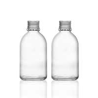 Vente en gros de bouteilles en verre rondes transparentes givrées à petite ouverture pour boissons et jus, de qualité alimentaire, avec bouchons, 150 ml, 250 ml, 350 ml, 500 ml