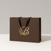 Sac de shopping en papier de luxe personnalisable avec logo imprimé sur mesure pour l'emballage et le conditionnement