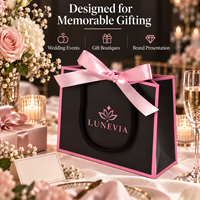 Custom Logo Luxury Art Paper Gift Bags with Cotton Rope Handles and Ribbon Bow for Boutique Retail Packaging Wholesale Orders
