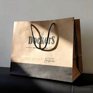 <b>Biodegradable</b> Wholesale Custom Logo Printed Clothing Shopping Market Retail Tote Brown Kraft Paper Bag <b>Packaging</b> With Handles - Product Image 1