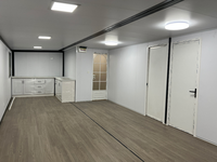 Maison conteneur préfabriquée extensible 20ft 40ft avec mur en verre, usine chinoise de maisons conteneurs préfabriquées