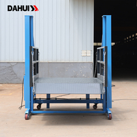 Plateforme de chargement mobile CE en acier au carbone pour entrepôt, élévateur de marchandises hydraulique à rail vertical 1,7 m 2000 kg