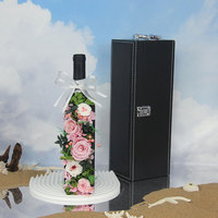 Vente en gros de fleurs et plantes éternelles préservées dans une bouteille de vin rouge, décoration d'intérieur, cadeau, rose en verre, fête des mères, remise de diplôme