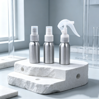 Flacons pulvérisateurs OEM de luxe en aluminium argenté 50ml 100ml 200ml 250ml, conteneurs à pompe pour cosmétiques et huiles essentielles, avec estampage or et finition soyeuse