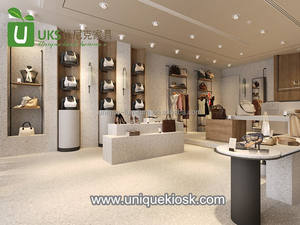 Joli <span class=keywords><strong>magasin</strong></span> <span class=keywords><strong>de</strong></span> vêtements design moderne au détail <span class=keywords><strong>magasin</strong></span> <span class=keywords><strong>de</strong></span> vêtements présentoir à chaussures étagère murale avec table <span class=keywords><strong>de</strong></span> présentation - Product Image 6