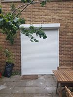 Porte de garage à enroulement vertical en alliage d'aluminium, moderne, pour entrepôt, à commande motorisée, résistante à la pluie, imperméable, durable