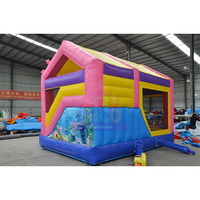 Château gonflable géant rose sur le thème du monde sous-marin avec toboggan, structure de jeux gonflable commerciale pour les fêtes d'anniversaire des enfants