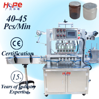 Machine automatique de scellage de bouteilles de thermoscelleuse de verre pour cosmétiques plateaux de tasses de yaourt machine de scellage de papier d'aluminium de pot de seau