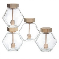 Vente en gros d'usine, pots en verre pour gelée de forme unique de 100 g, 250 g, 500 g avec couvercle en métal et impression de logo