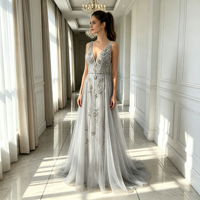 Robe de soirée longue en tulle argenté, col en V profond, sans manches, coupe trapèze, ornée de fleurs et de perles faites à la main, pour bal de promo ou soirée formelle