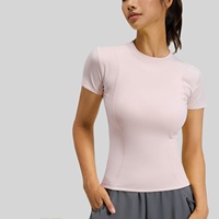 Haut de yoga à manches courtes pour femme, coupe ajustée, col rond, séchage rapide, avec coutures profilées, coupe courte, pour l'entraînement sportif