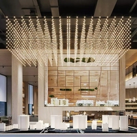 Lampes suspendues en cristal d'ingénierie personnalisées, grand cube lumineux, pour hall d'hôtel, centre commercial, département des ventes, table de sable, Sound Ball