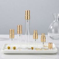 Vente en gros de flacons de parfum ronds en verre transparent ALKA de 10 ml avec pompe pulvérisatrice dorée, logo personnalisé imprimé, diffuseur de parfum
