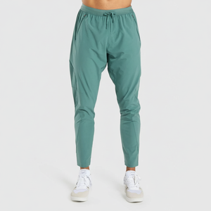Pantalon de jogging mi-lourd en mélange polyester/coton tissé, décontracté, uni, respirant, pour hommes, vente en gros - Product Image 1