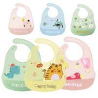 Vente en gros de bavoirs en silicone pour bébé de qualité alimentaire, réglables, pliables et souples, imperméables et faciles à nettoyer