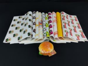 กระดาษห่ออาหารกันไขมันสำหรับแฮมเบอร์เกอร์และพิซซ่า พิมพ์ลายโลโก้ รุ่น SP2981 กระดาษคราฟท์แบบผนังเดียว เกรดสำหรับอาหาร - Product Image 4