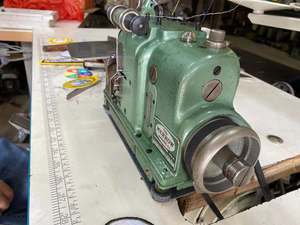 เครื่องเย็บผ้าโอเวอร์ล็อค รุ่น Merrow MG-3D สำหรับปักตราสัญลักษณ์ ปักอีโบเล็ต และปักแถบแขนเสื้อแบบใช้ในประเทศ - Product Image 5