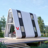 Cabine de luxe moderne préfabriquée en alliage d'aluminium étanche, portable, facile à transporter, design capsule Apple, maison solaire