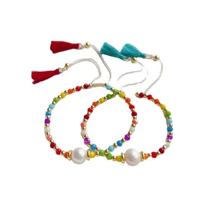 Vente en gros de bracelets de mode INS Bohème à pompons colorés perles de cristal perles d'eau douce charme d'amitié bijoux pour femmes