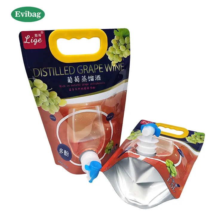 Bolsa de plástico para embalaje de líquido de jugo portátil personalizada en caja con válvula 1L 2L bolsa de vino de uva con boquilla bolsa de pie para bebidas