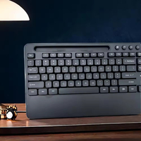 Clavier filaire ergonomique noir pleine taille avec repose-poignets, support de téléphone et touches multimédias K27 – Prix usine