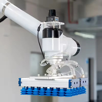 Palettiseur collaboratif 50 kg, bras robotisé industriel, empilage automatique pour cartons, caisses et sacs lourds dans les entrepôts logistiques