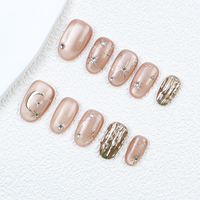 Luxe or étoile oeil de chat acrylique fait à la main court rond presse sur les ongles en gros marque privée faux ongles courts pour le doigt