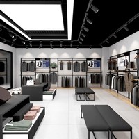 Présentoir de Magasin de Vêtements en Métal Personnalisé pour Costumes Homme avec Support Mural pour Vêtements et Comptoir d'Exposition
