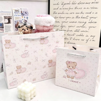 Sacs cadeaux en papier recyclable rose avec poignée en corde pour l'emballage des bougies