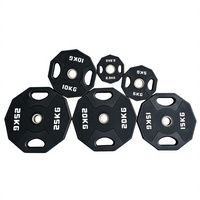 Plaques de poids en PVC caoutchouté à 10 coins avec un diamètre de trou de 5 cm, conçues pour les haltères et l'entraînement de force en salle