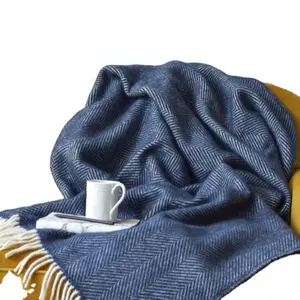 Le nappe personalizzate tessute di ispirazione morbida del progettista lanciano la coperta indiana a spina di pesce all'ingrosso per il divano