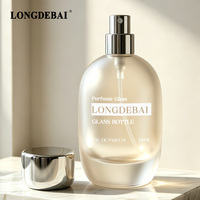 Flacon de parfum de luxe élégant en verre dépoli mat 50ml 100ml avec capuchon cylindrique or/argent pour Eau de Parfum vide
