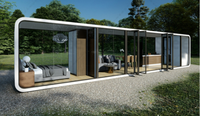 Conteneur de bureau mobile de 40 pieds, design moderne, carré, respirant, certifié CE, pour extérieur, avec terrasse, idéal pour les bâtiments de bureaux