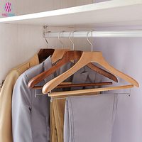 Fournisseur chinois de cintres personnalisés Sabitan Ng Amerikana, cintres en bois triangulaires lisses, empilables et durables pour les magasins de vêtements